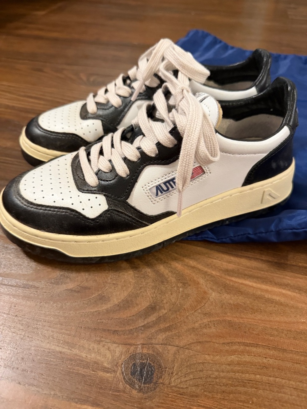 Autry Medalist Low-Top Sneakers in White and Black